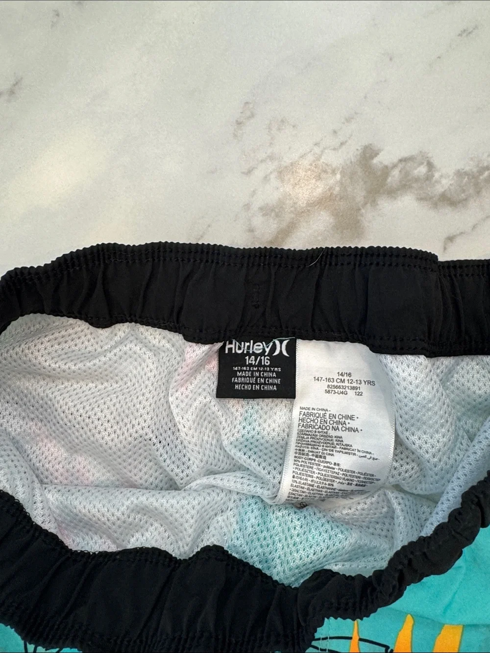 Hurley Teal Tropical Leaf Swim Shorts with Black Waistband